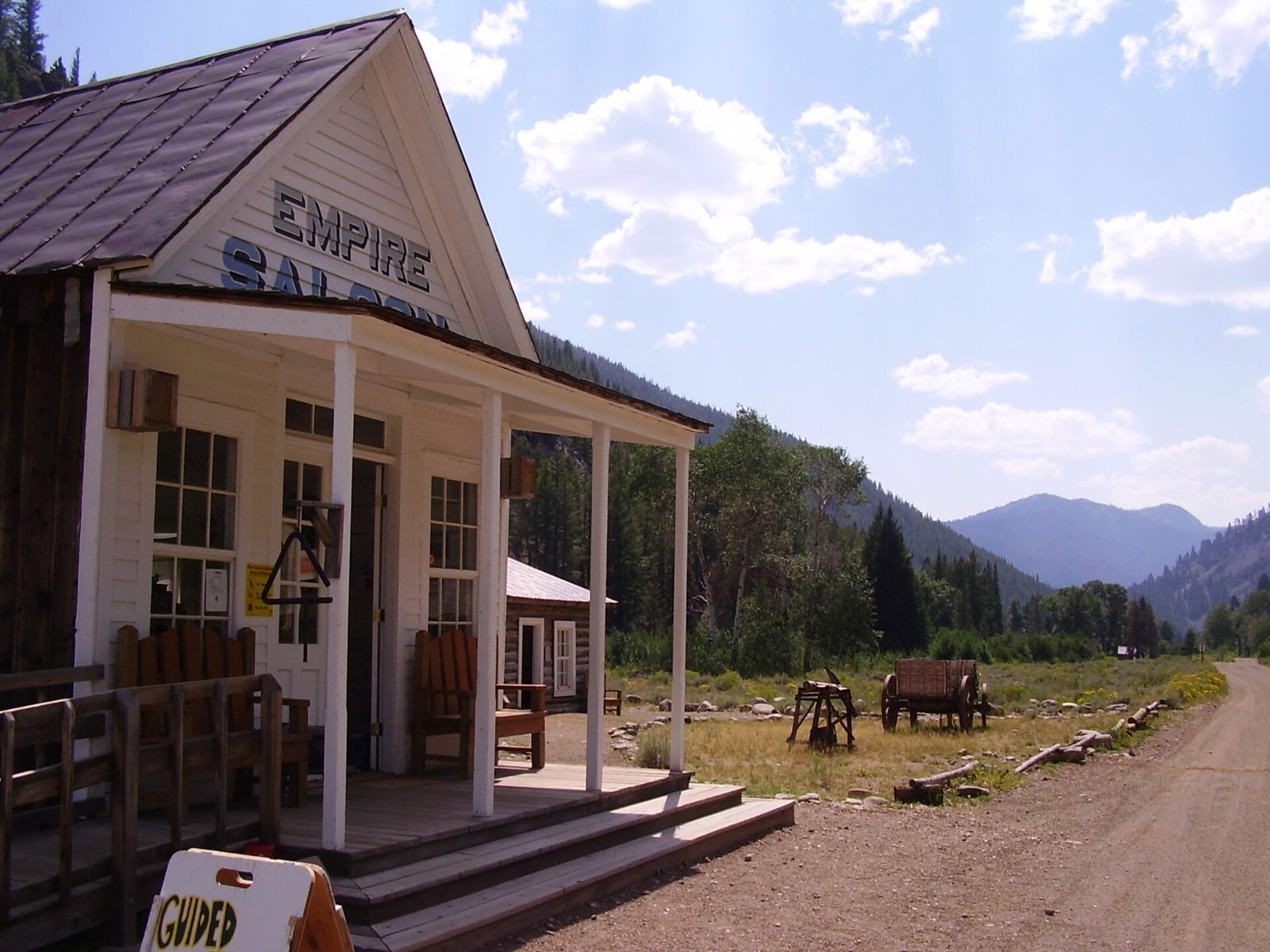 Weathered wooden Empire Saloon building in Custer